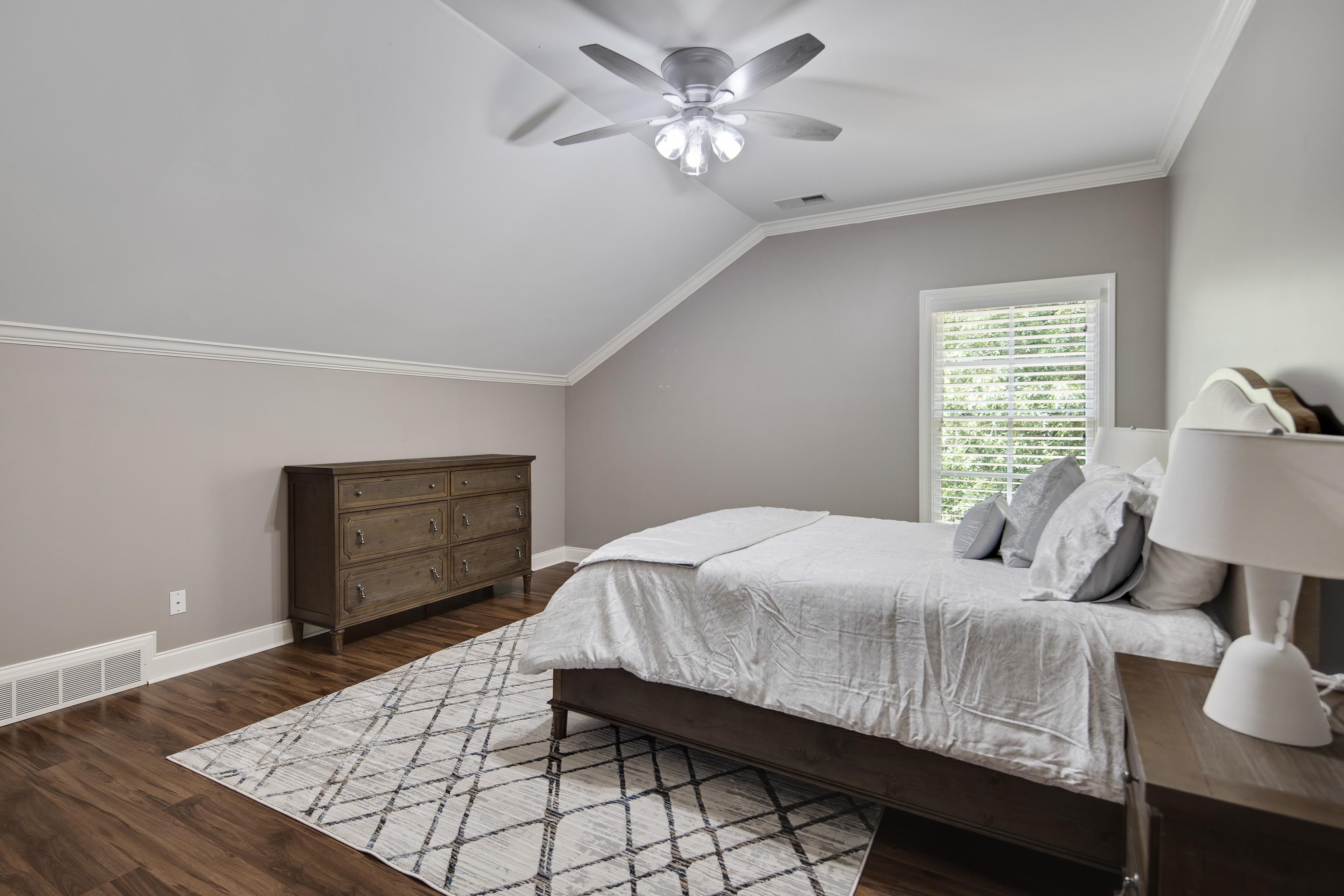 159 Lynn Road Eads, TN 38028 - Photo 21 of 40 3rd Full Bedroom Upstairs! New Ceiling Fan, Laminate Floors, Walk in Closet and Shared Bathroom with beautiful Updates!
