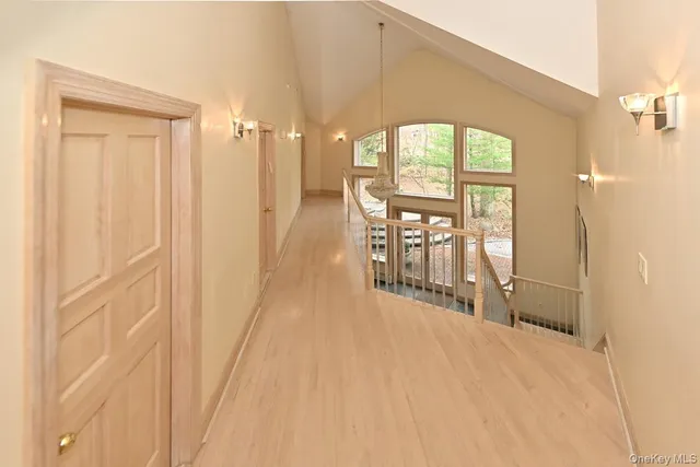 a view of a porch with a table and chairs