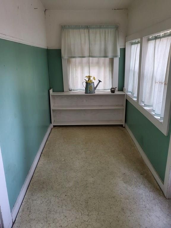 808 Patriots Road Templeton, MA 01468 - Photo 4 of 22 a bathroom with a sink a mirror and a window
