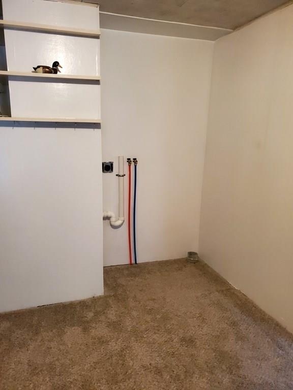 808 Patriots Road Templeton, MA 01468 - Photo 8 of 22 a view of a room with racks on the wall