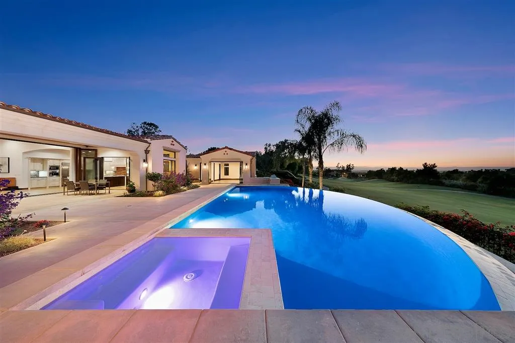 6806 St Andrews Road Rancho Santa Fe, CA 92067 - Photo 14 of 25 a view of a house with swimming pool yard and lake view