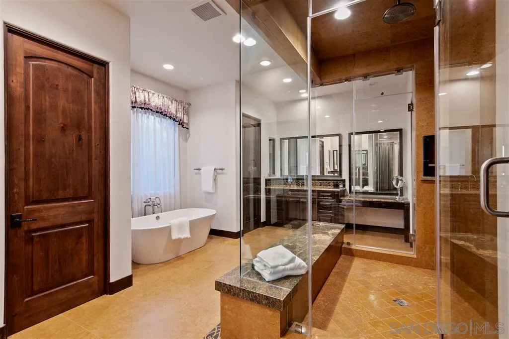 6806 St Andrews Road Rancho Santa Fe, CA 92067 - Photo 17 of 25 a large room with lots of chairs and mirrors