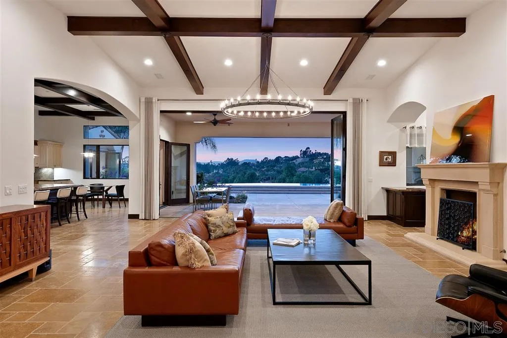 6806 St Andrews Road Rancho Santa Fe, CA 92067 - Photo 2 of 25 a living room with furniture and a fireplace