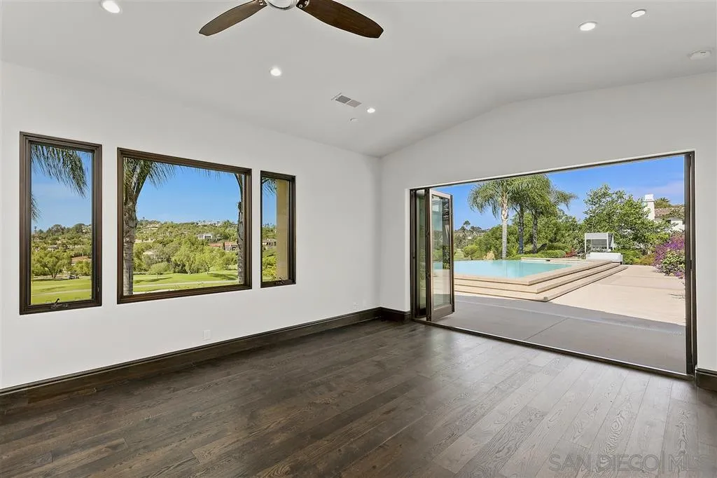 6806 St Andrews Road Rancho Santa Fe, CA 92067 - Photo 21 of 25 wooden floor in an empty room with a window