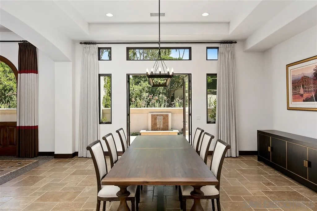 6806 St Andrews Road Rancho Santa Fe, CA 92067 - Photo 10 of 25 a view of a a dining room with furniture window and wooden floor