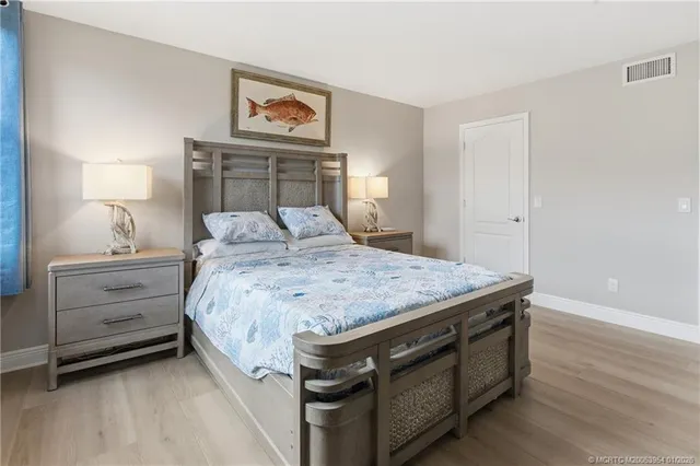 a bedroom with a bed and a cabinets