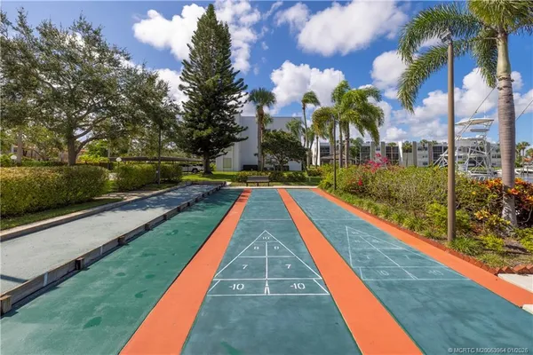 a view of swimming pool with a yard