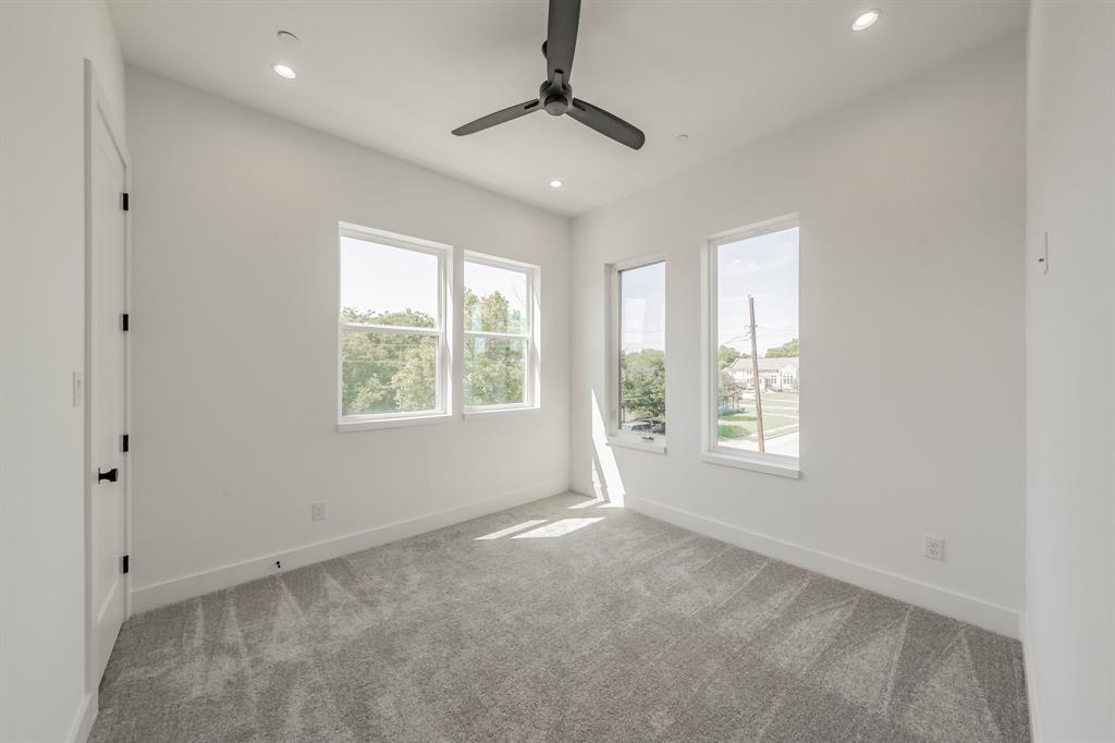5320 Reiger Avenue, Unit 103 Dallas, TX 75214 - Photo 20 of 29 a view of an empty room with a window