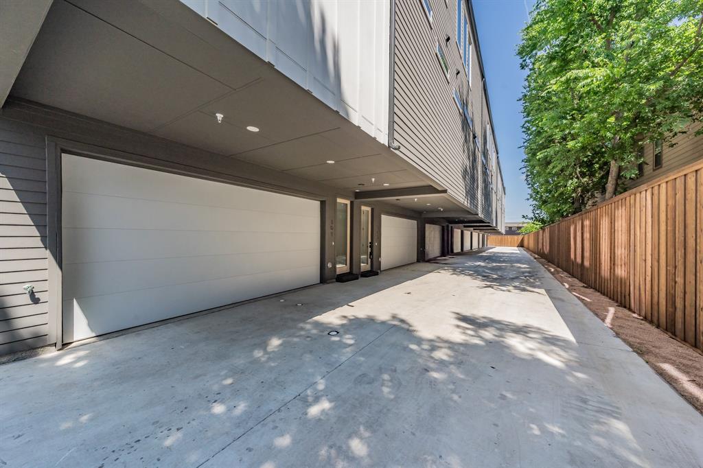 5320 Reiger Avenue, Unit 103 Dallas, TX 75214 - Photo 26 of 29 a view of a house with backyard and trees
