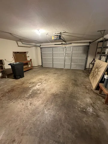 a view of a room with washer and dryer