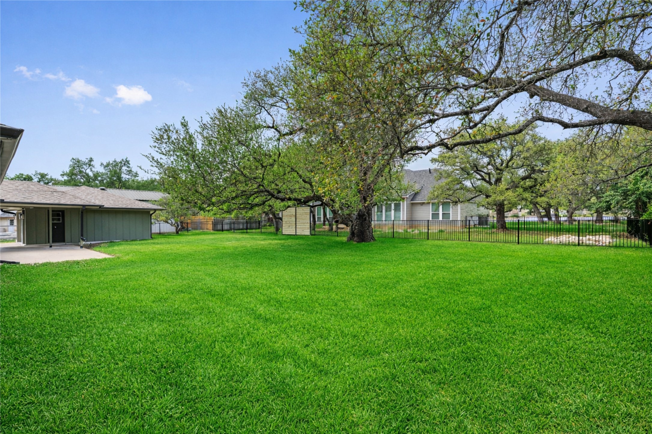 224 Clear Spring Road Georgetown, TX 78628 - Photo 8 of 40 a view of a house with a back yard
