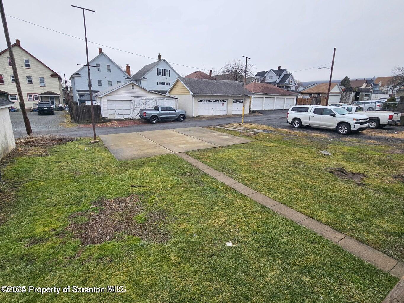 1531 Washburn Street, Unit 1 Scranton, PA 18504 - Photo 6 of 6 a car parked in front of house