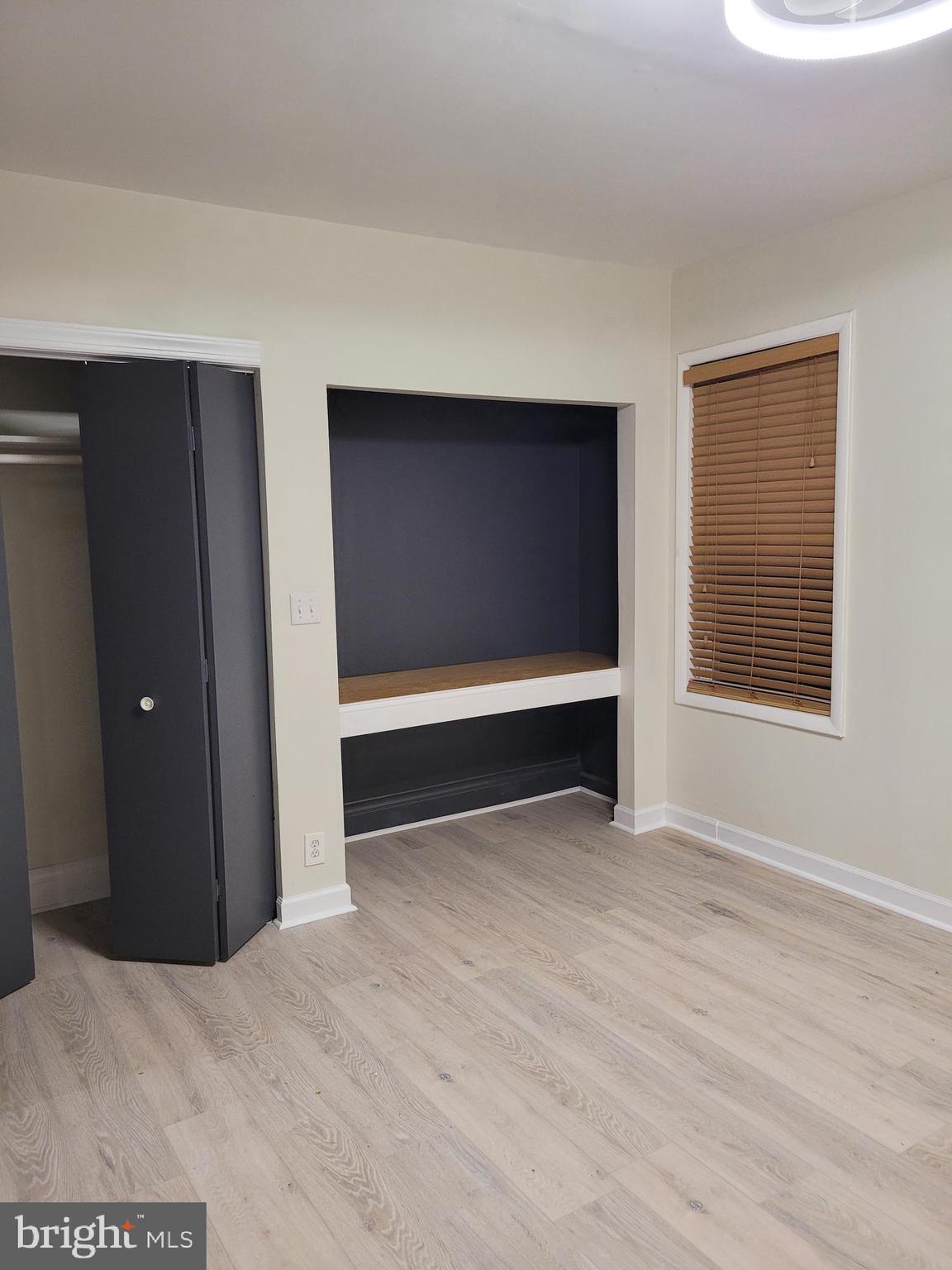 2502 Federal Street Philadelphia, PA 19146 - Photo 16 of 31 a view of an empty room with wooden floor and closet