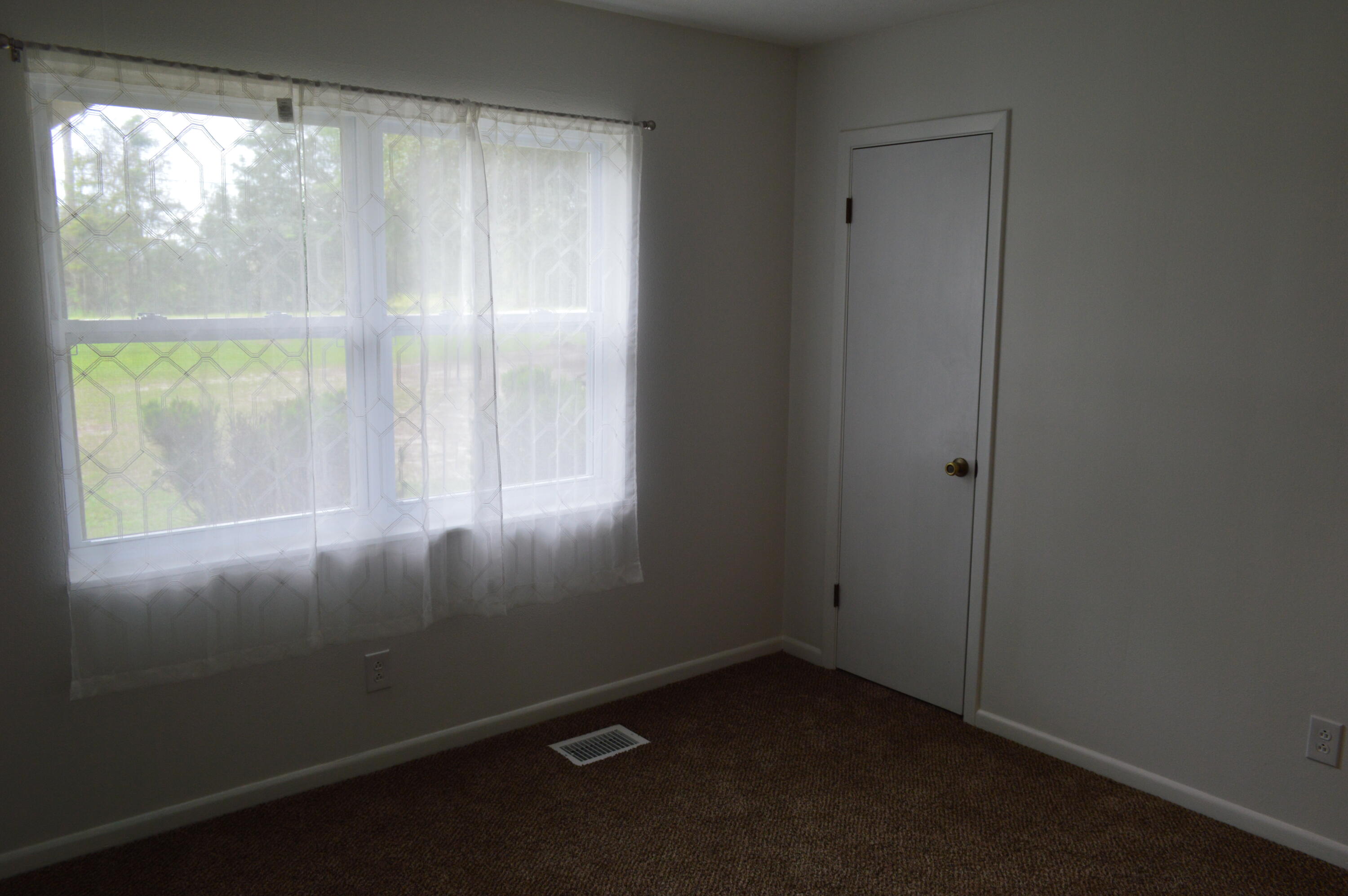 7582 Goat Hill Road See Remarks, AL 36477 - Photo 11 of 43 a view of an empty room and window