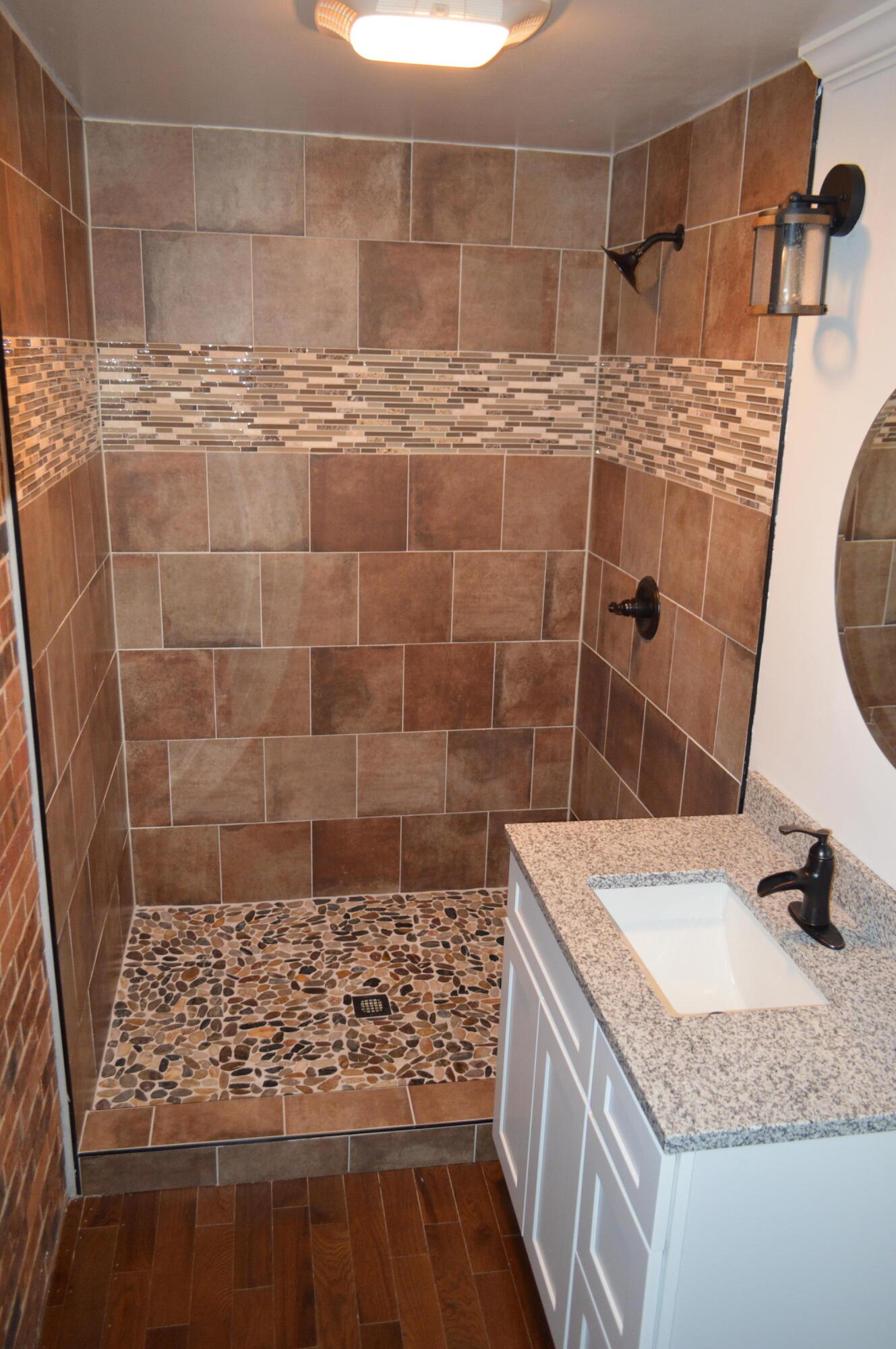 7582 Goat Hill Road See Remarks, AL 36477 - Photo 21 of 43 a bathroom with a granite countertop shower a sink