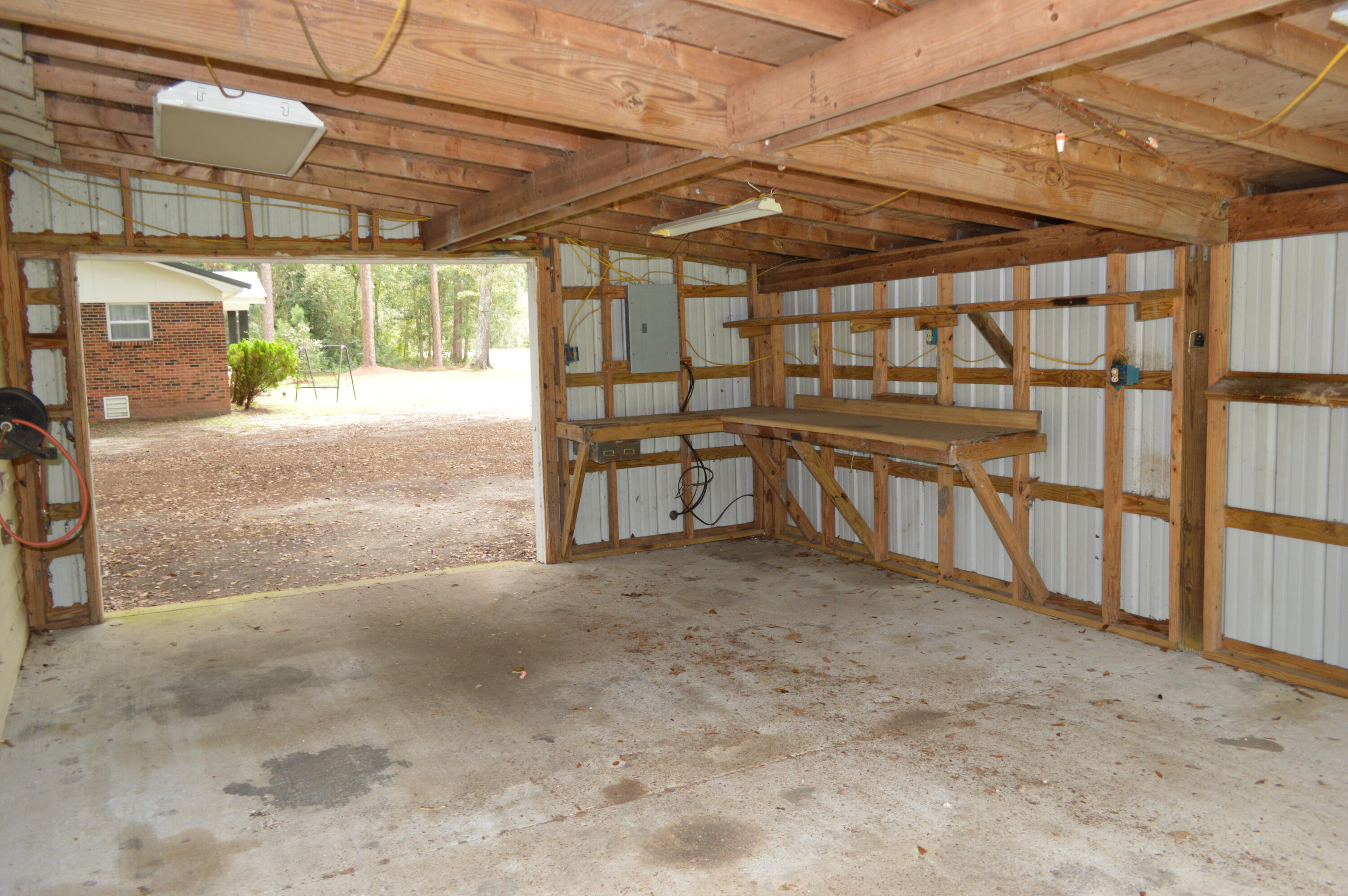 7582 Goat Hill Road See Remarks, AL 36477 - Photo 28 of 43 a view of a room with racks on the wall