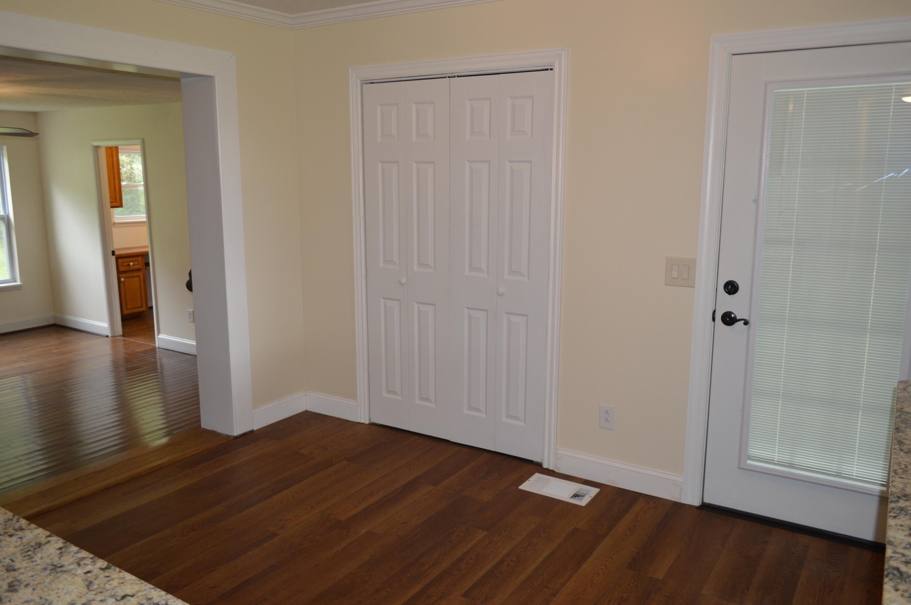 7582 Goat Hill Road See Remarks, AL 36477 - Photo 5 of 43 a view of a hallway with wooden floor