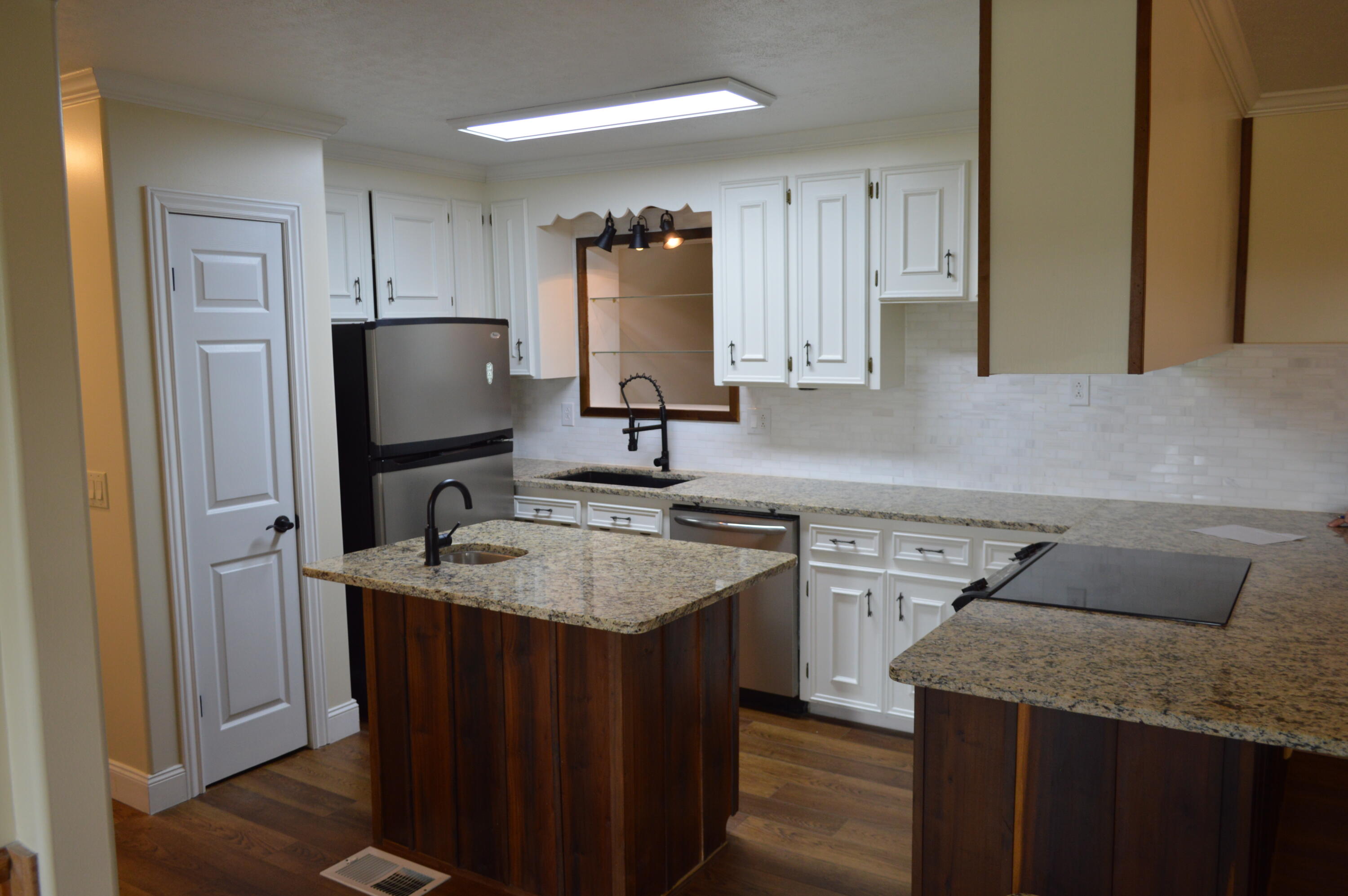 7582 Goat Hill Road See Remarks, AL 36477 - Photo 8 of 43 a kitchen with a sink stove and refrigerator