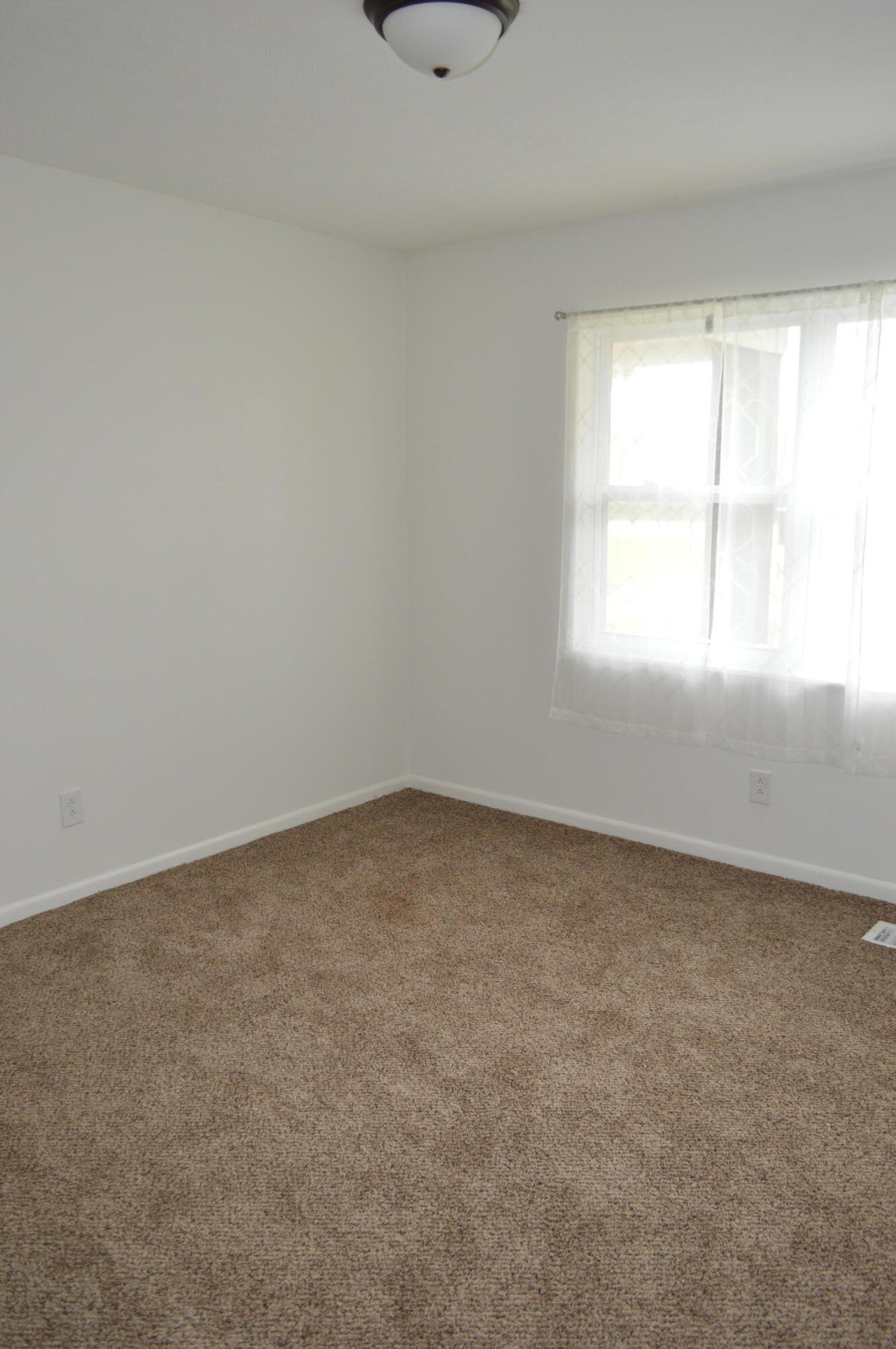 7582 Goat Hill Road See Remarks, AL 36477 - Photo 10 of 43 an empty room with a window