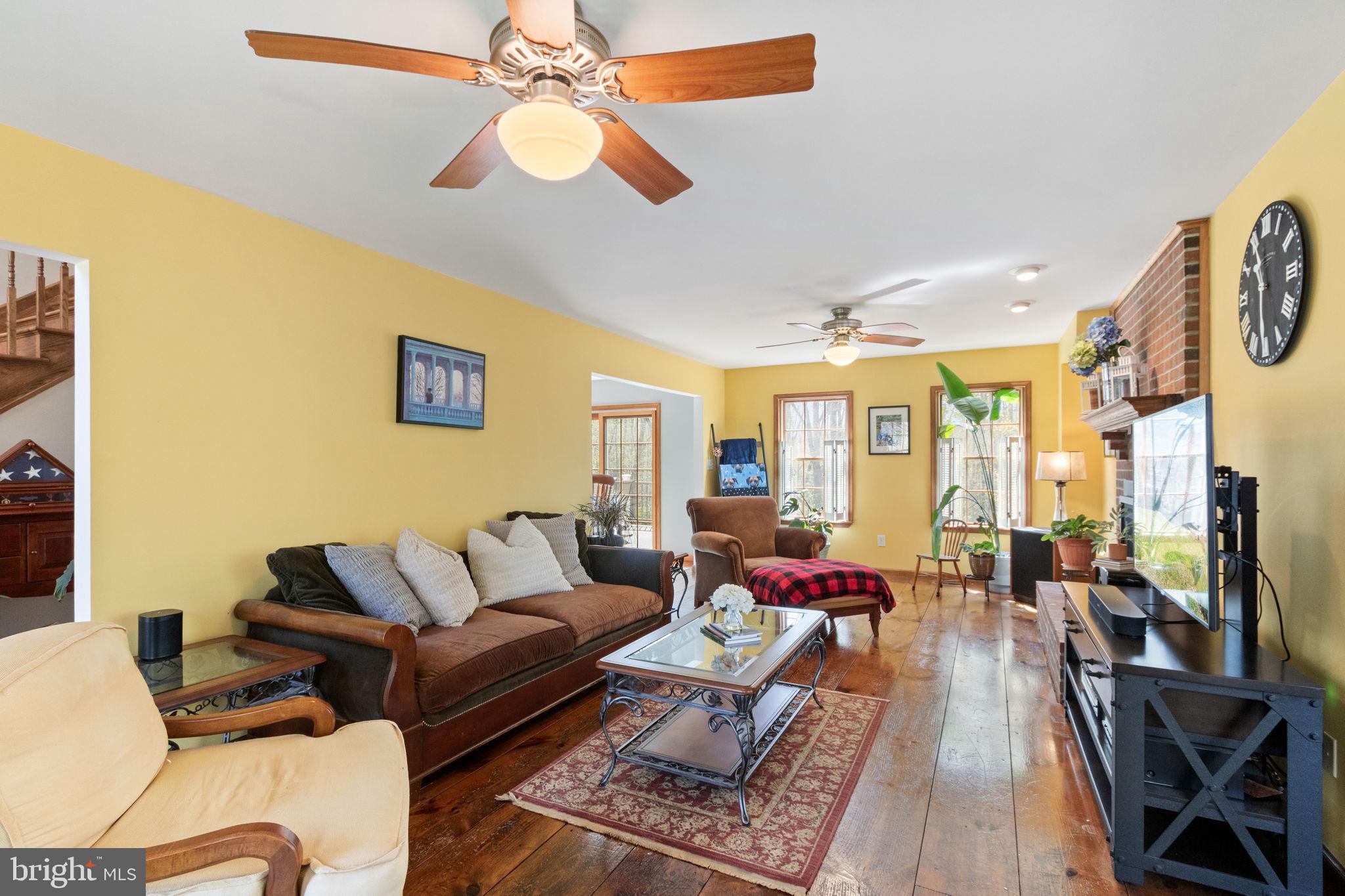 135 Cropp Road Fredericksburg, VA 22406 - Photo 11 of 67 a living room with furniture or couch and a chandelier