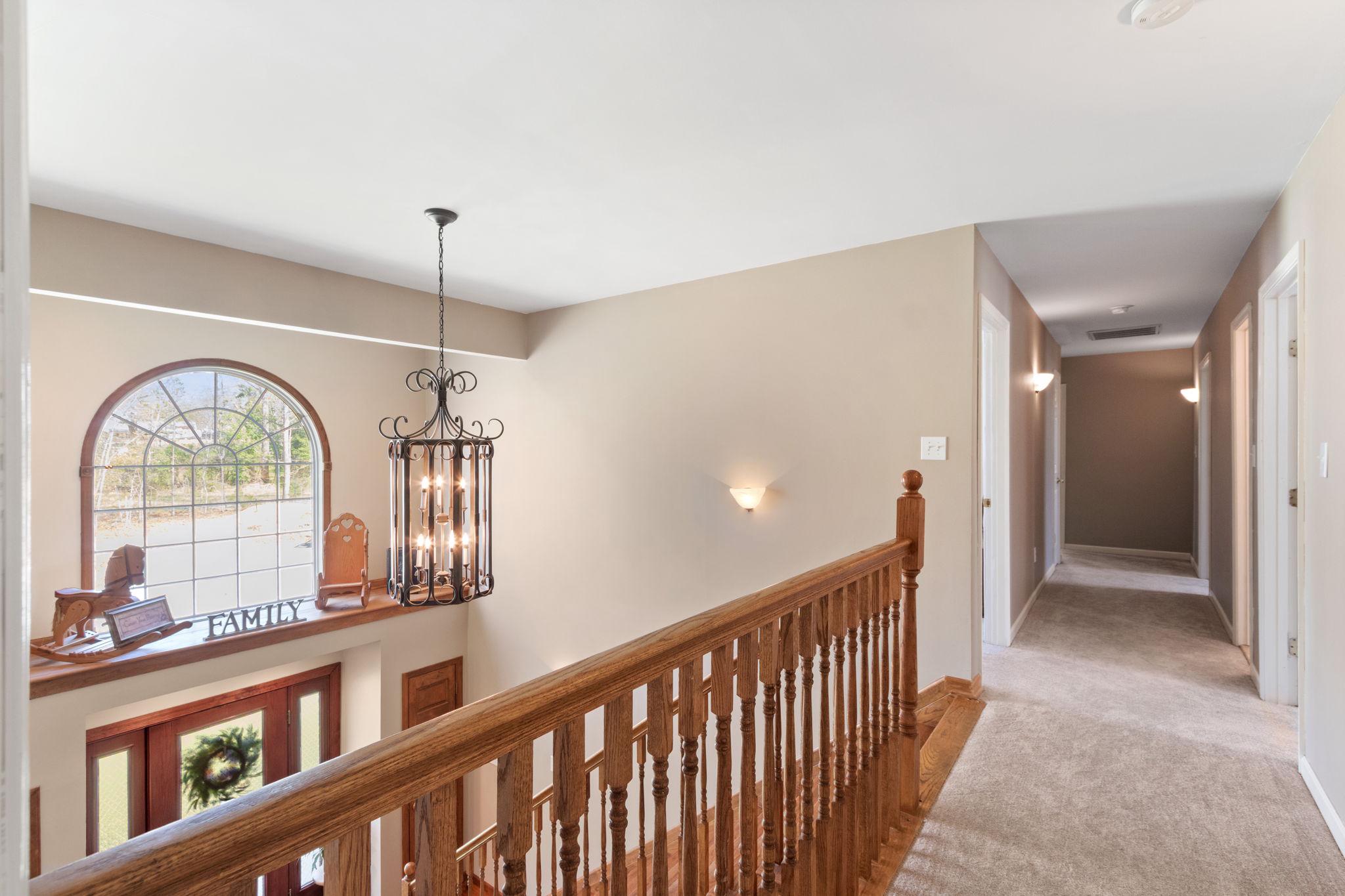 135 Cropp Road Fredericksburg, VA 22406 - Photo 28 of 67 a view of hall with wooden floor and windows