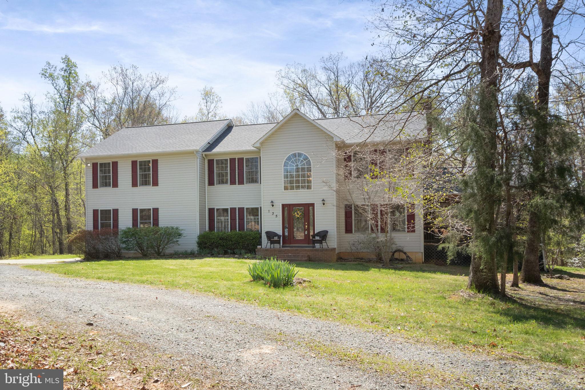 135 Cropp Road Fredericksburg, VA 22406 - Photo 4 of 67 a front view of house with yard and green space