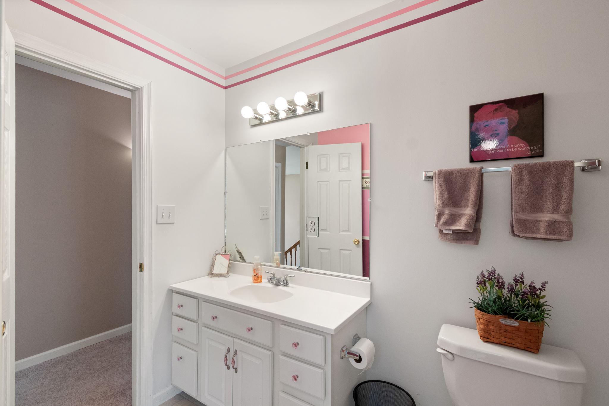 135 Cropp Road Fredericksburg, VA 22406 - Photo 41 of 67 a bathroom with a toilet sink and mirror