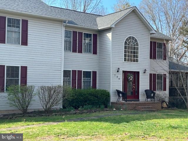135 Cropp Road Fredericksburg, VA 22406 - Photo 5 of 67 a view of a house with a yard and plants