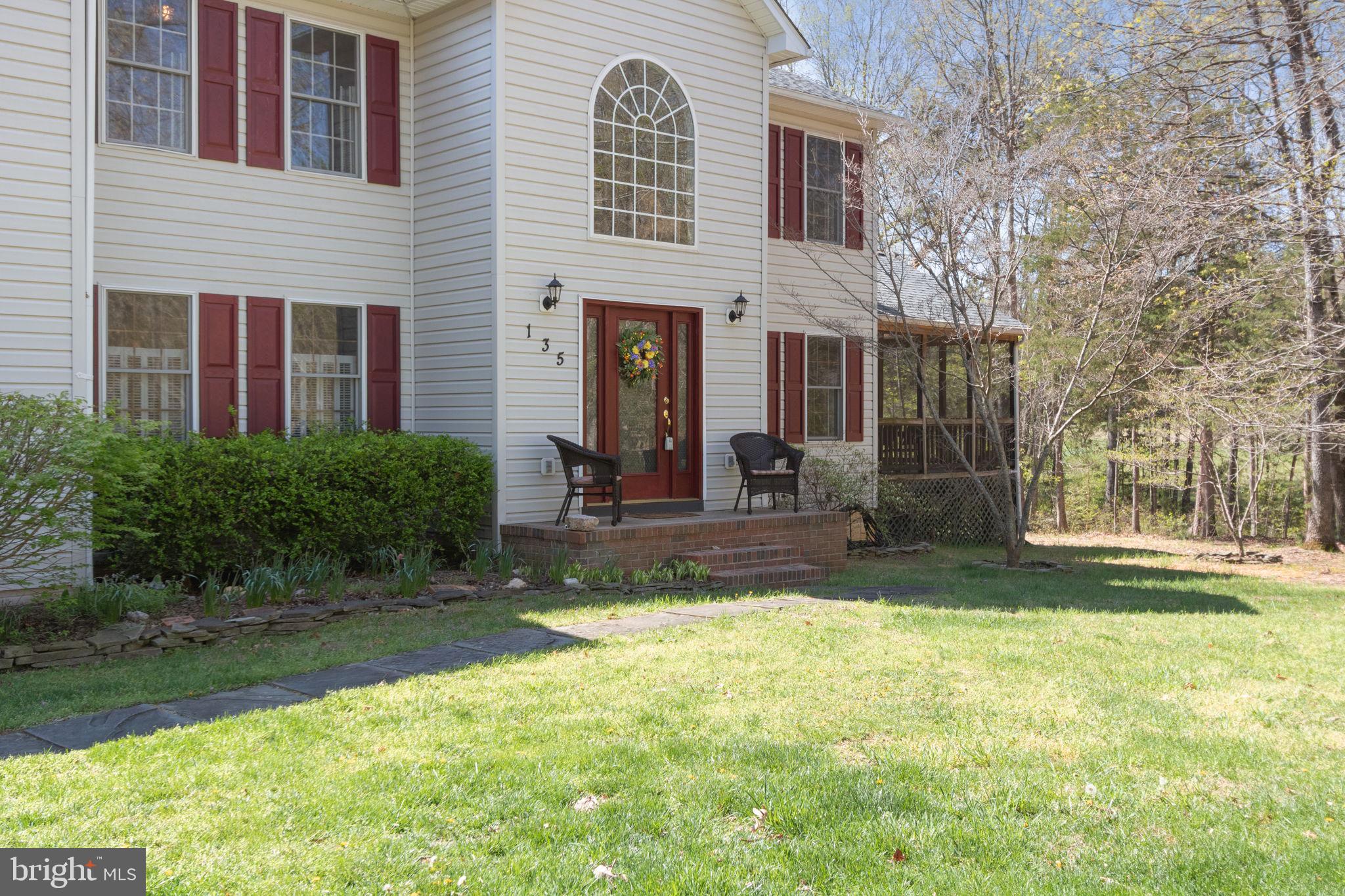135 Cropp Road Fredericksburg, VA 22406 - Photo 6 of 67 a view of a house with backyard and sitting area
