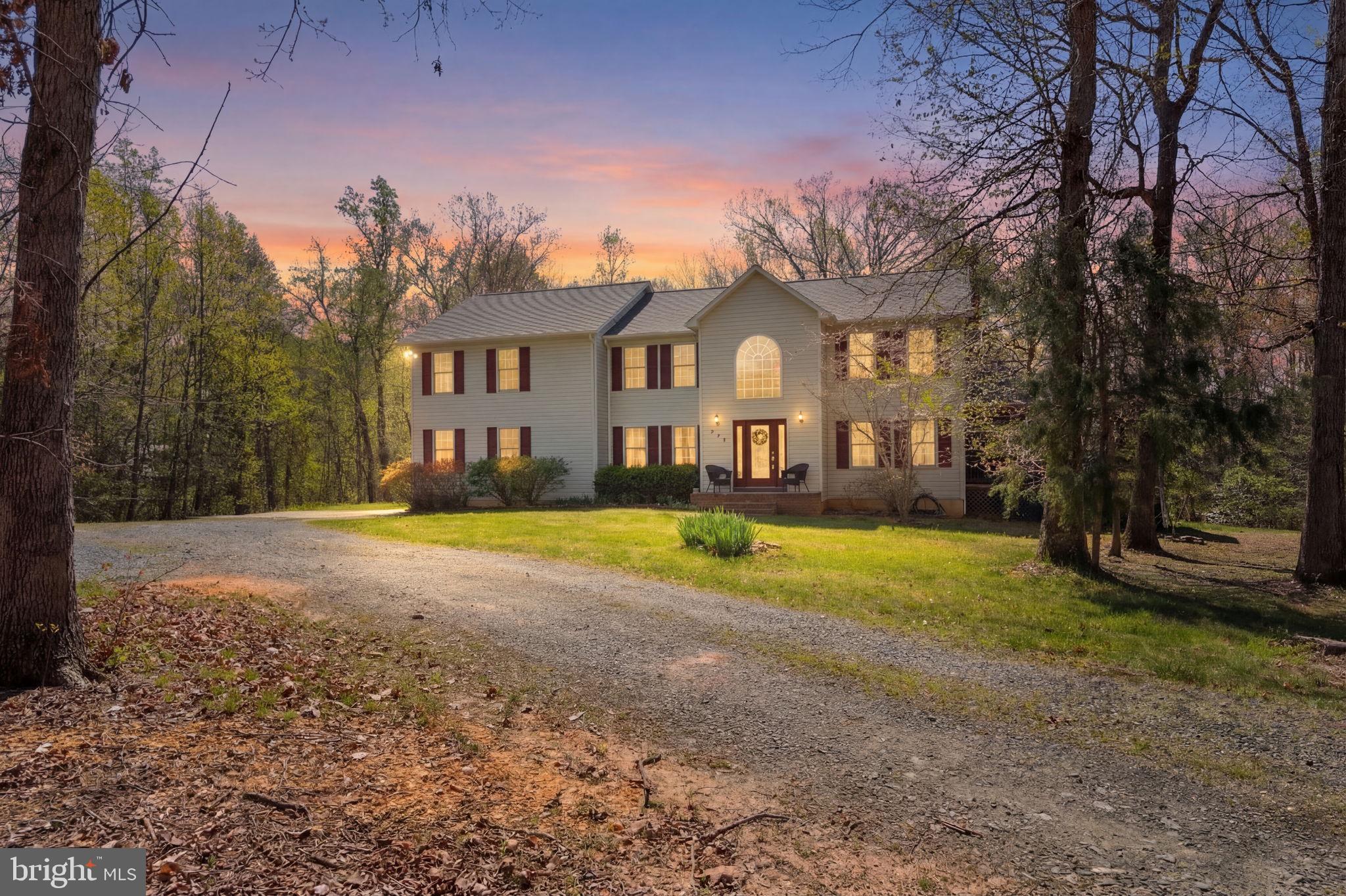 135 Cropp Road Fredericksburg, VA 22406 - Photo 67 of 67 a view of large house with a big yard and large trees