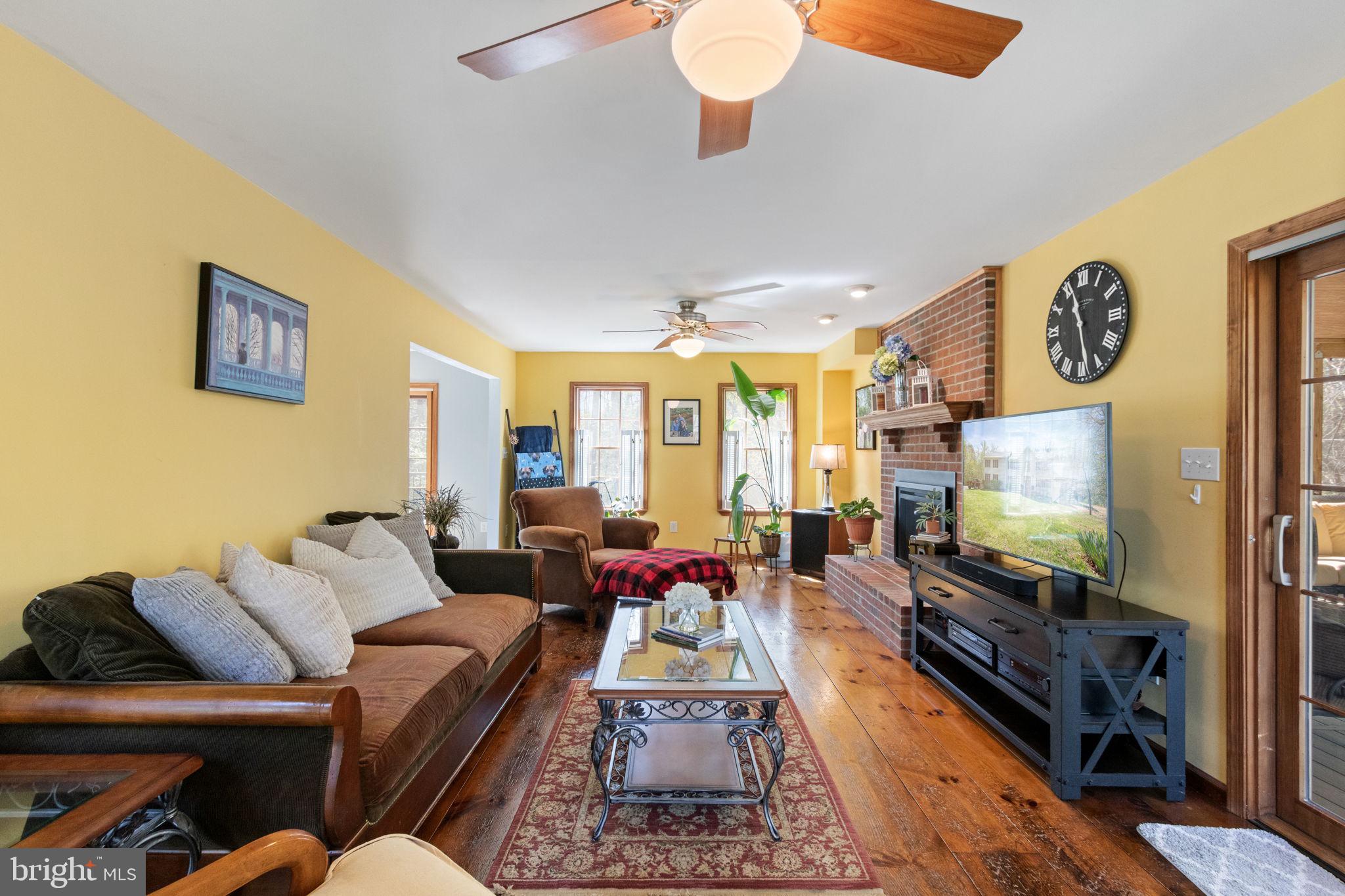 135 Cropp Road Fredericksburg, VA 22406 - Photo 10 of 67 a living room with furniture and a flat screen tv