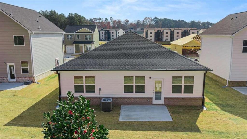 159 Holland Cove Winder, GA 30680 - Photo 7 of 8 a aerial view of a house with a yard