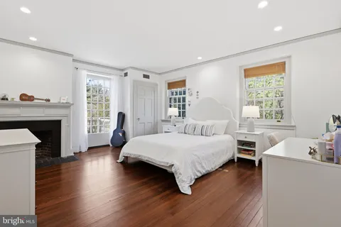 a kitchen with stainless steel appliances granite countertop a sink and a refrigerator