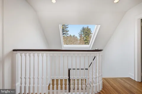 a bed room with a bed and a fireplace
