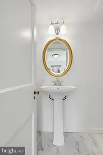 a kitchen that has a sink and a stove