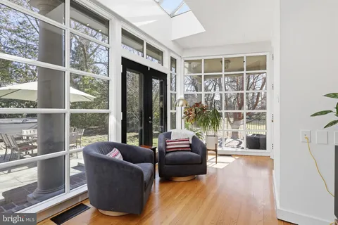 a kitchen with stainless steel appliances granite countertop a kitchen island sink refrigerator and cabinets
