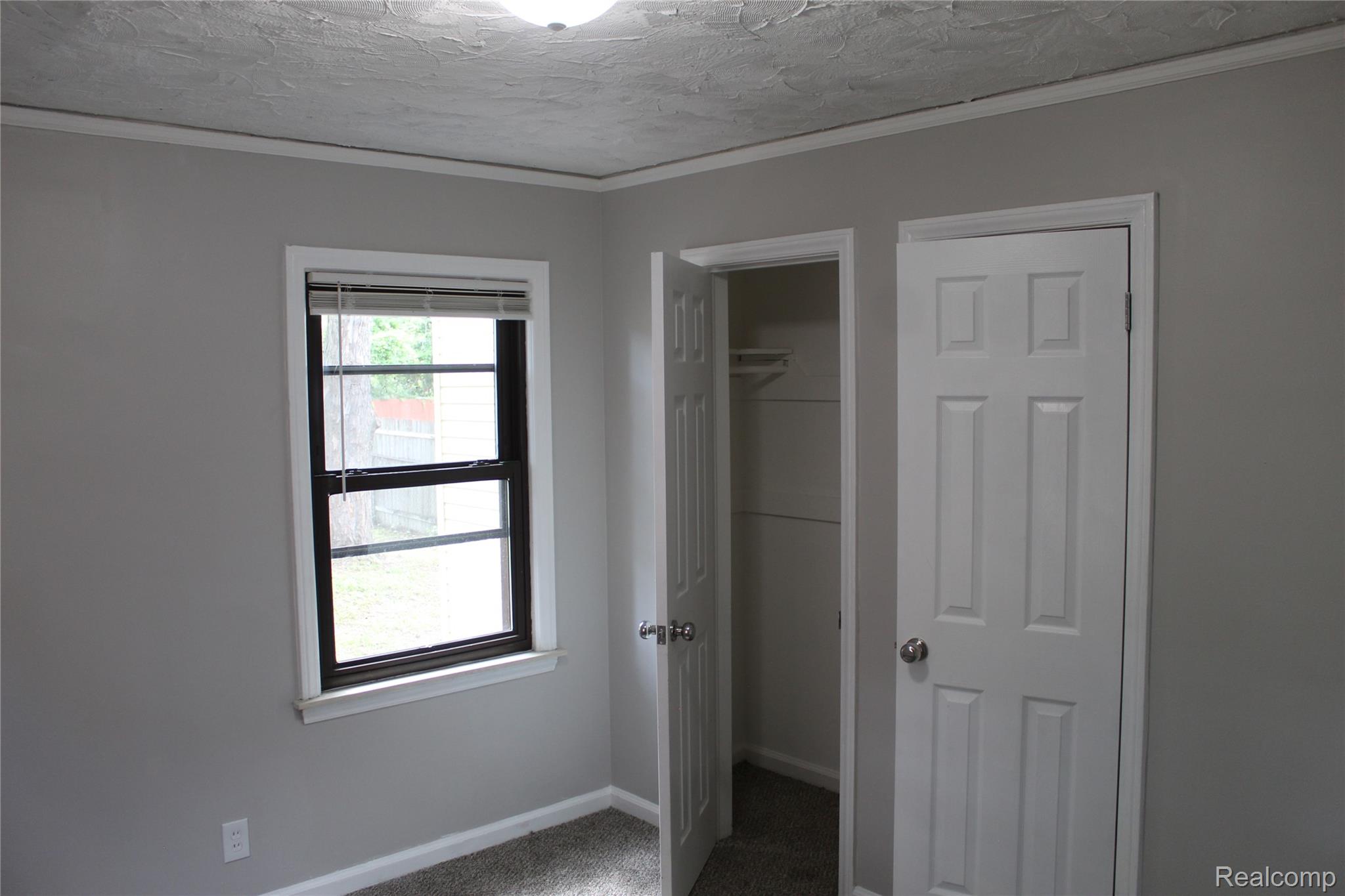 5543 Balfour Road Detroit, MI 48224 - Photo 15 of 54 Room featuring light gray painted walls and white trim