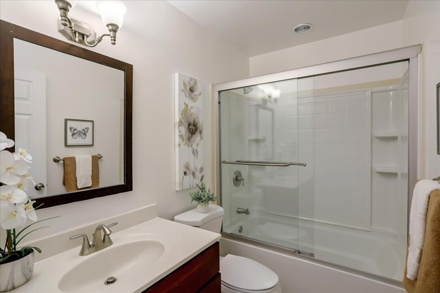 202 Greentree Way Milpitas, CA 95035 - Photo 22 of 28 a bathroom with a sink a toilet and shower