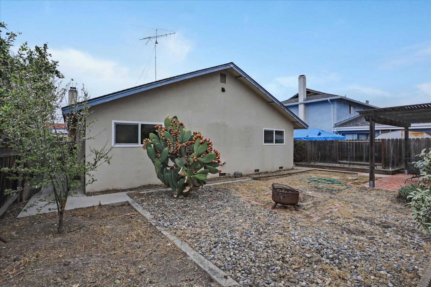 202 Greentree Way Milpitas, CA 95035 - Photo 26 of 28 a backyard of a house with barbeque oven table and chairs