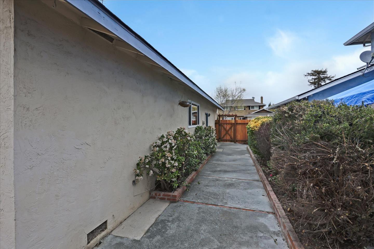 202 Greentree Way Milpitas, CA 95035 - Photo 28 of 28 a side view of a house with a pathway