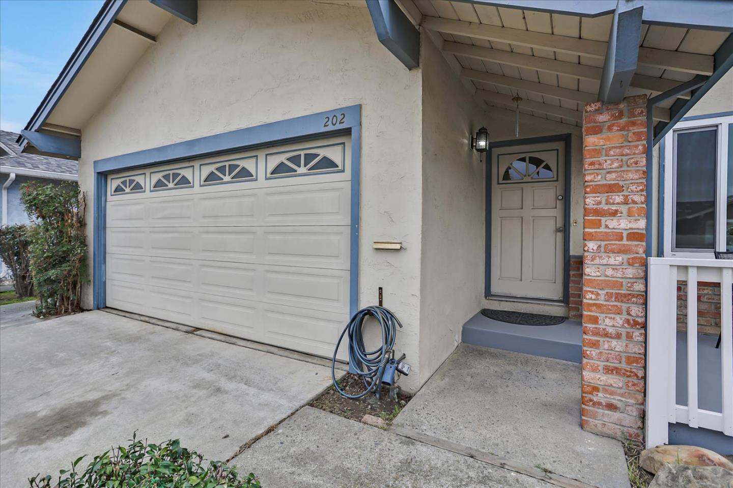 202 Greentree Way Milpitas, CA 95035 - Photo 4 of 28 a view of a door and chair in the room
