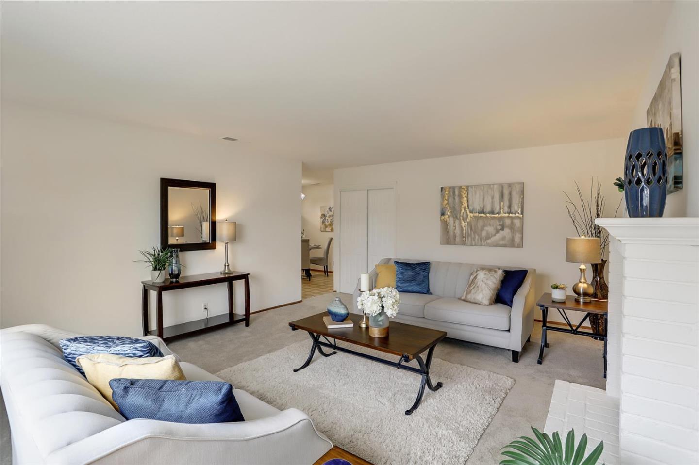202 Greentree Way Milpitas, CA 95035 - Photo 8 of 28 a living room with furniture and wooden floor