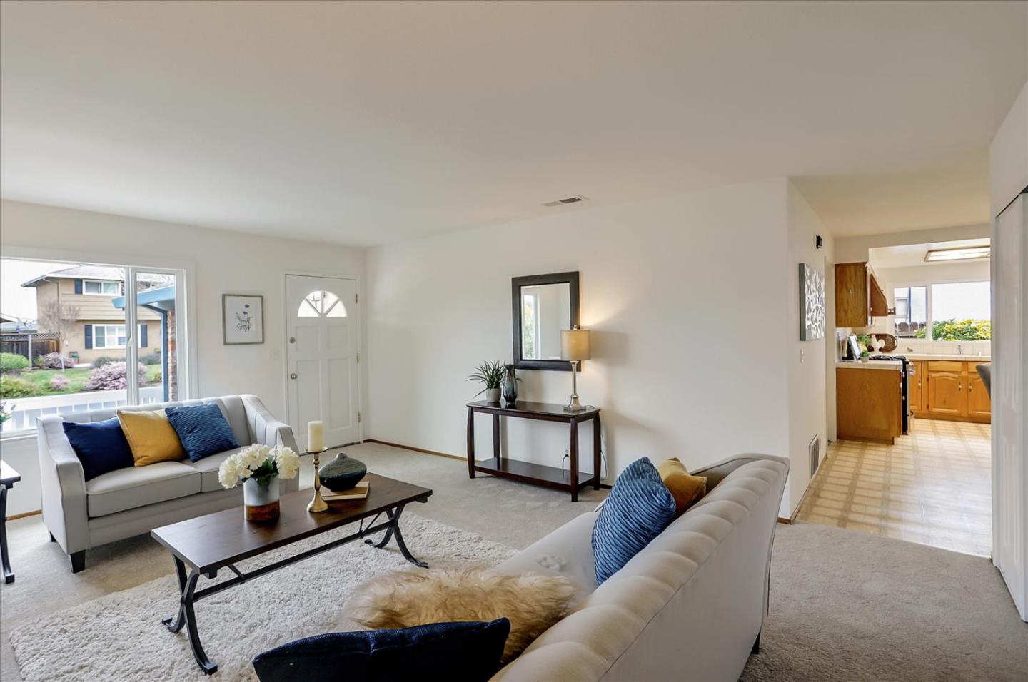 202 Greentree Way Milpitas, CA 95035 - Photo 10 of 28 a living room with furniture and a table