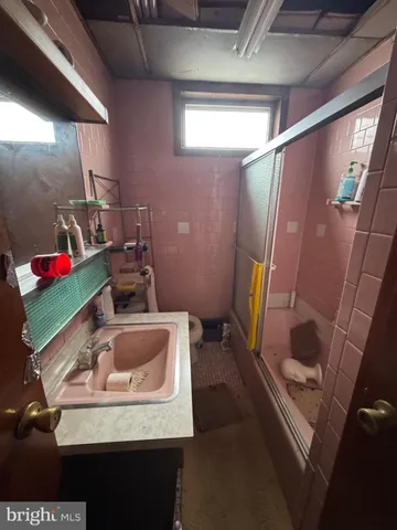 a storage room with washer and dryer