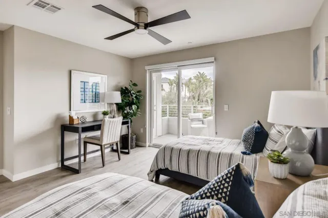 a bedroom with a bed and a table