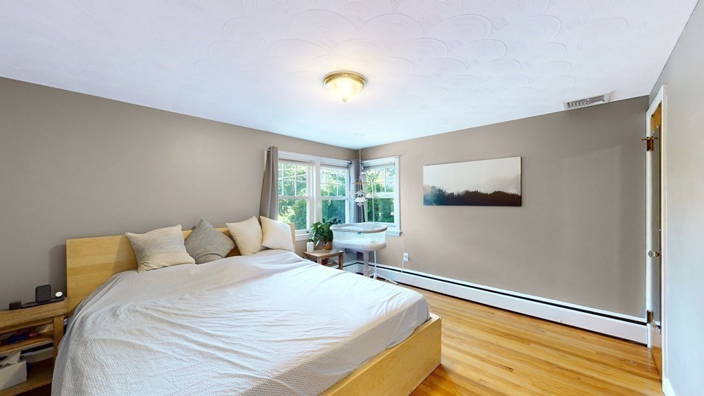 12 James Street Winchester, MA 01890 - Photo 13 of 23 a bedroom with a bed and a window