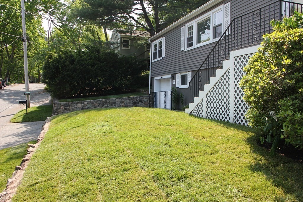 12 James Street Winchester, MA 01890 - Photo 4 of 23 a view of swimming pool with garden