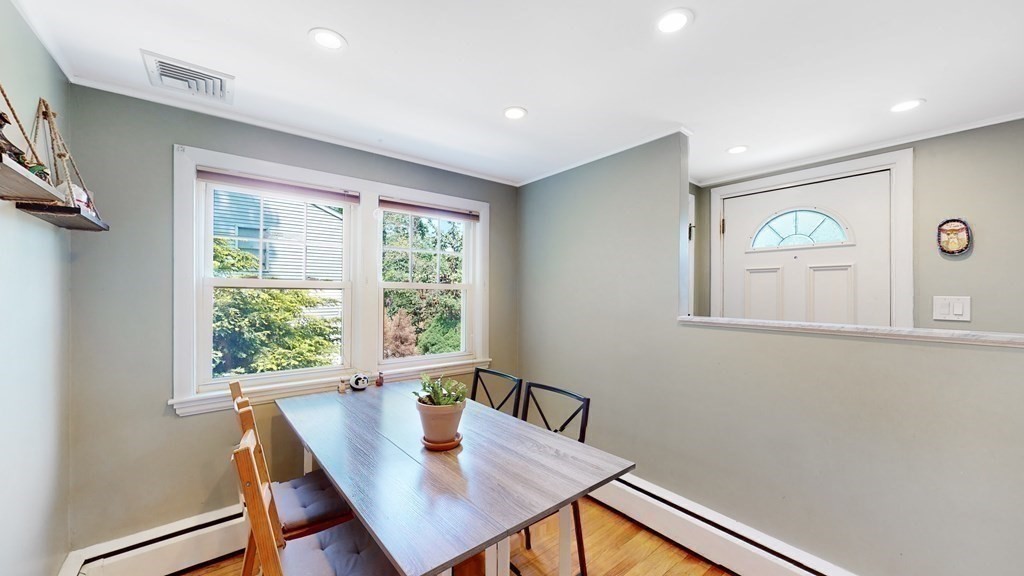 12 James Street Winchester, MA 01890 - Photo 10 of 23 a view of a dining room with furniture window and outside view