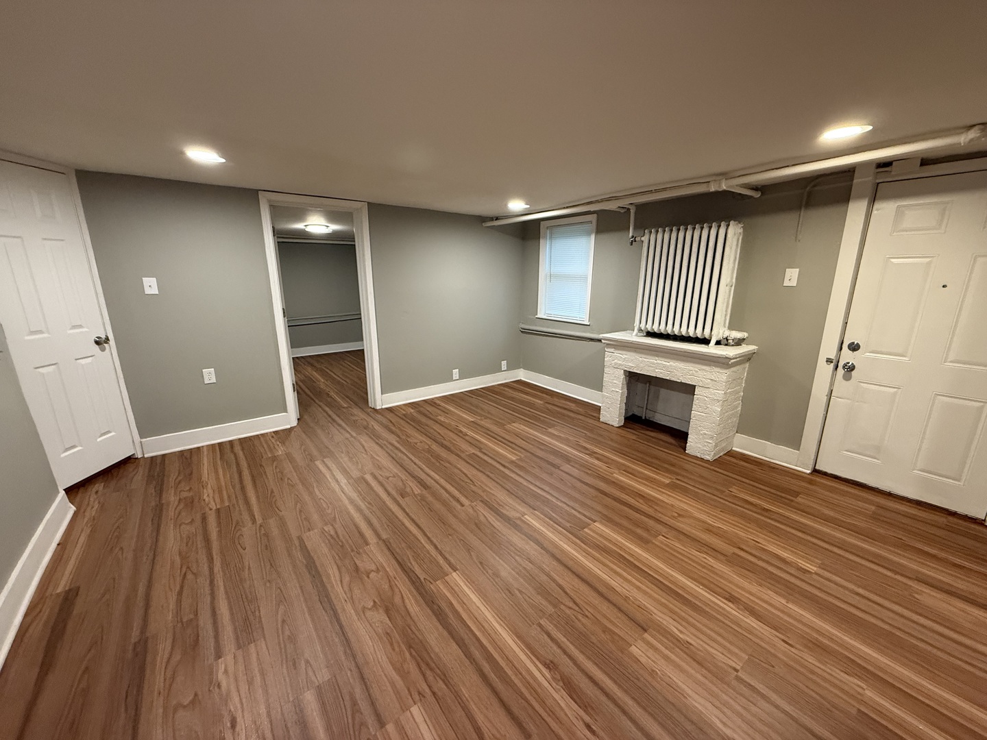 202 South Grove Street Urbana, IL 61802 - Photo 2 of 8 a view of empty room with wooden floor