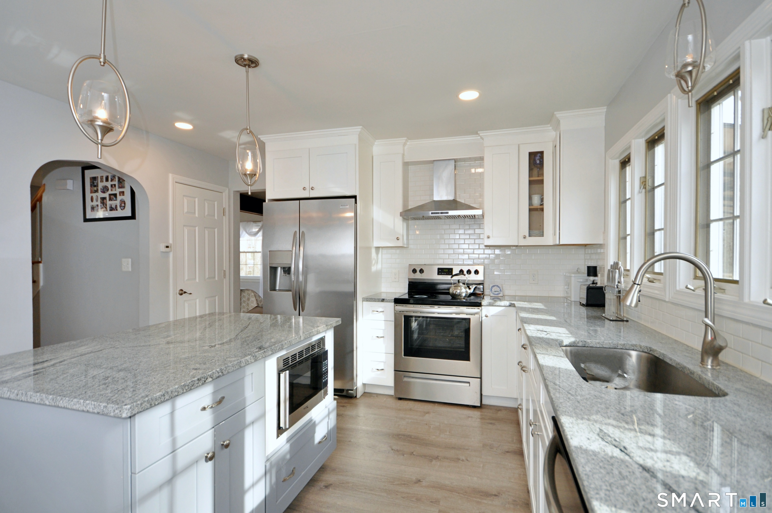 21 Maple Drive Prospect, CT 06712 - Photo 2 of 29 a kitchen with stainless steel appliances granite countertop a sink a stove and a refrigerator